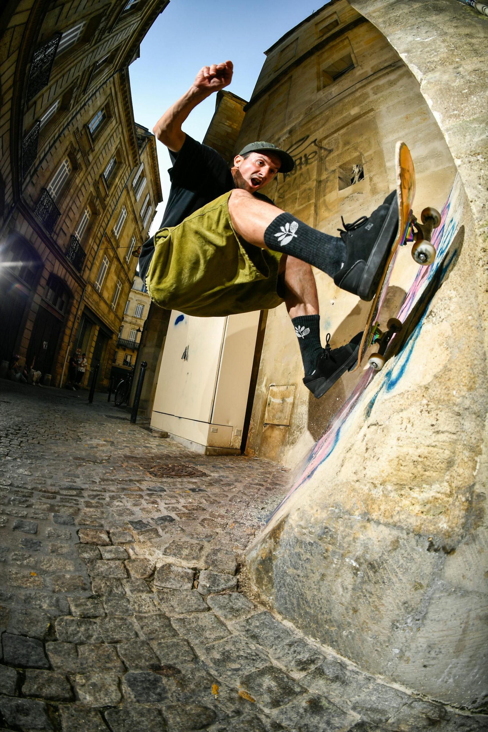 LEO VALLS, FRONTSIDE WALLRIDE, BORDEAUX FRANCE/ This was biggest Pi-pi bank I saw. Stone wall and tiny blue sky.