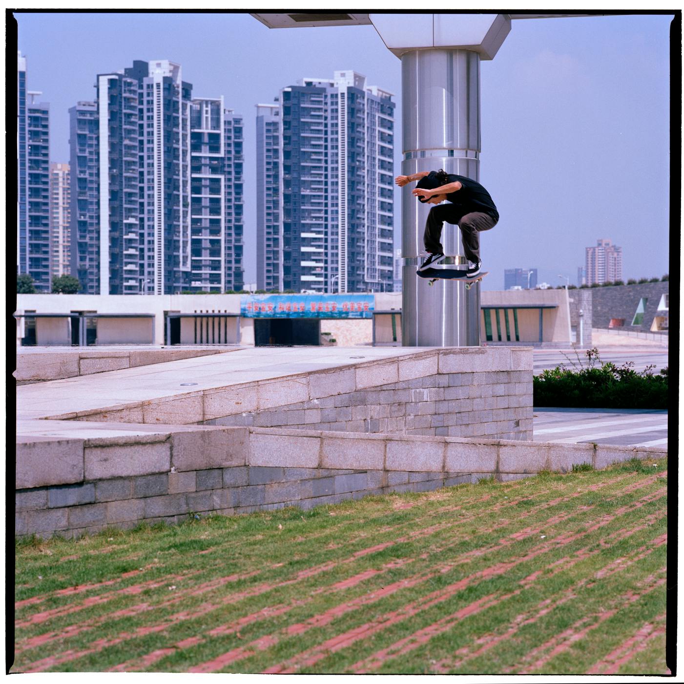 Takashi Yamaguchi backside 180 heelflip, Shenzhen China, around 2008